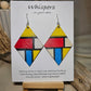 Mondrian Inspired Large Statement Hand Painted Diamond Shape Wood Earrings. Colorful rectangular shapes and black lines,. Blues red, black and white Painted black edges. Back is in similar color and design. Ultra light weight. Enameled for durability. 2 3/4" in size. Sterling silver findings and hangs 3" in length