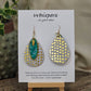 Golden Dots paper over wood 2" Ultra light weight Tear drop earring. This design is on both sides. Hanging hand painted gold edged teal artisan paper pendant. Then gold metal feather charm hangs in front. Enameled for durability. 14kg over Sterling silver findings. Hangs 2 1/4" in length