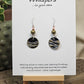 Metallic Wave Hand Painted/Crafted Paper Earrings. 3/4" Circular Drop black artisan paper with metallic painted edges. Hangs from metal decorative gold and olive green beads, Resin Coating for durability. Back is done to compliment. Sterling silver findings. Hangs 1 1/2"