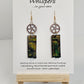 Copper Steampunk Hand Painted Paper and Wood Earrings. 1/2" x 1 5/8" Paper Rectangle hand painted brightly colored background with silver and copper accents. Edged in black. Hanging from Copper notched circular gear.  Back is painted to match. Resin coating for durability. Sterling Silver findings. Hangs 2 1/2" in length