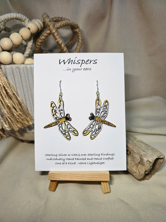 Dragonfly Wood Die Cut Hand Painted in metallic silver, bronze and gold acrylics. Resin coating for durability. Both sides are painted. Ultra light weight. Mixed metal findings of Sterling silver and 14kg over sterling. Hangs 2"