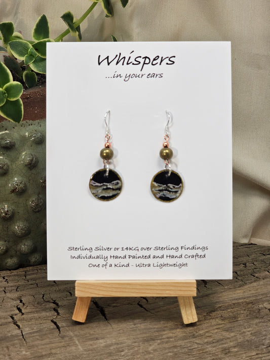 Metallic Wave Hand Painted/Crafted Paper Earrings. 3/4" Circular Drop black artisan paper with metallic painted edges. Hangs from metal decorative gold and olive green beads, Resin Coating for durability. Back is done to compliment. Sterling silver findings. Hangs 1 1/2"