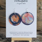 Hand painted watercolor ultra lightweight paper earrings.  Iridescent blues and copper. Double layered design. Back painted similar color design.  Circular in shape. 14kg over silver findings. Hangs 2" in Length