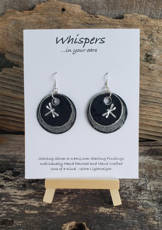 Hand crafted hand painted ultra lightweight paper earrings.  Glossy black with metal 3-D Dragonfly accent. Iridescent pewter textured double Layer Circular in shape. Sterling silver findings. Hangs 1 3/4" in Length